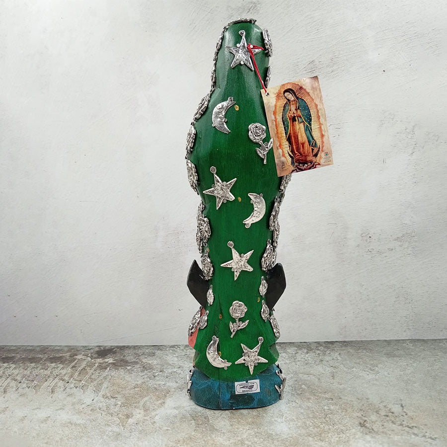 Virgin of Guadalupe with "milagritos"