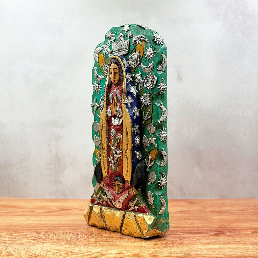 Virgin of Guadalupe with radiance and "milagritos"