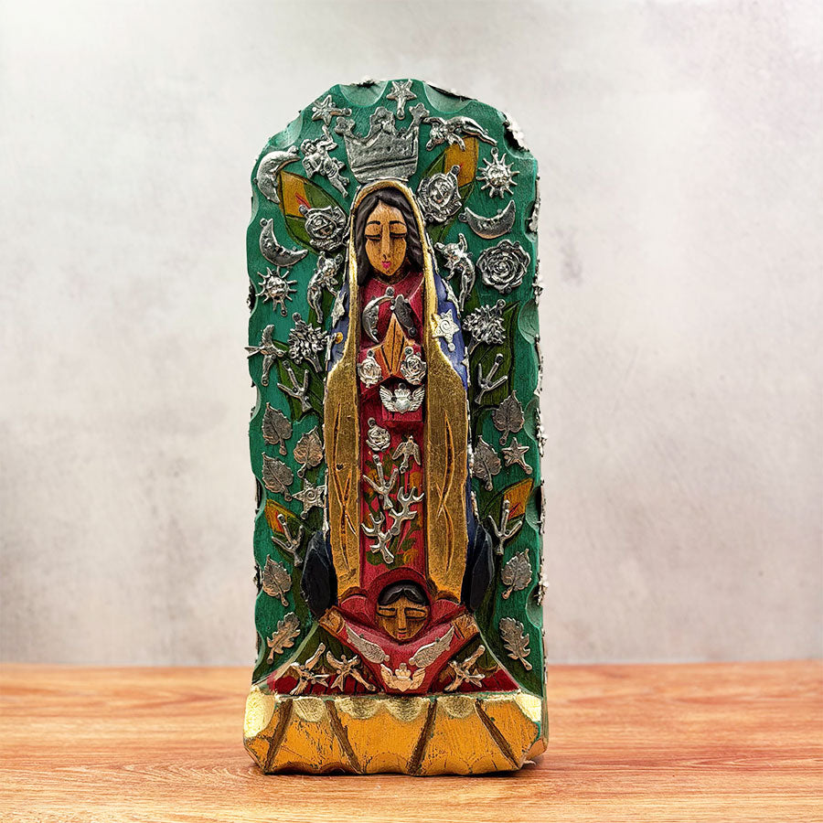 Virgin of Guadalupe with radiance and "milagritos"